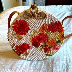 Anthropology Round Hand-woven Rattan crossbody purse.